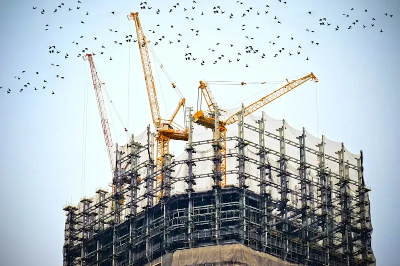 Engineering construction site with tower cranes